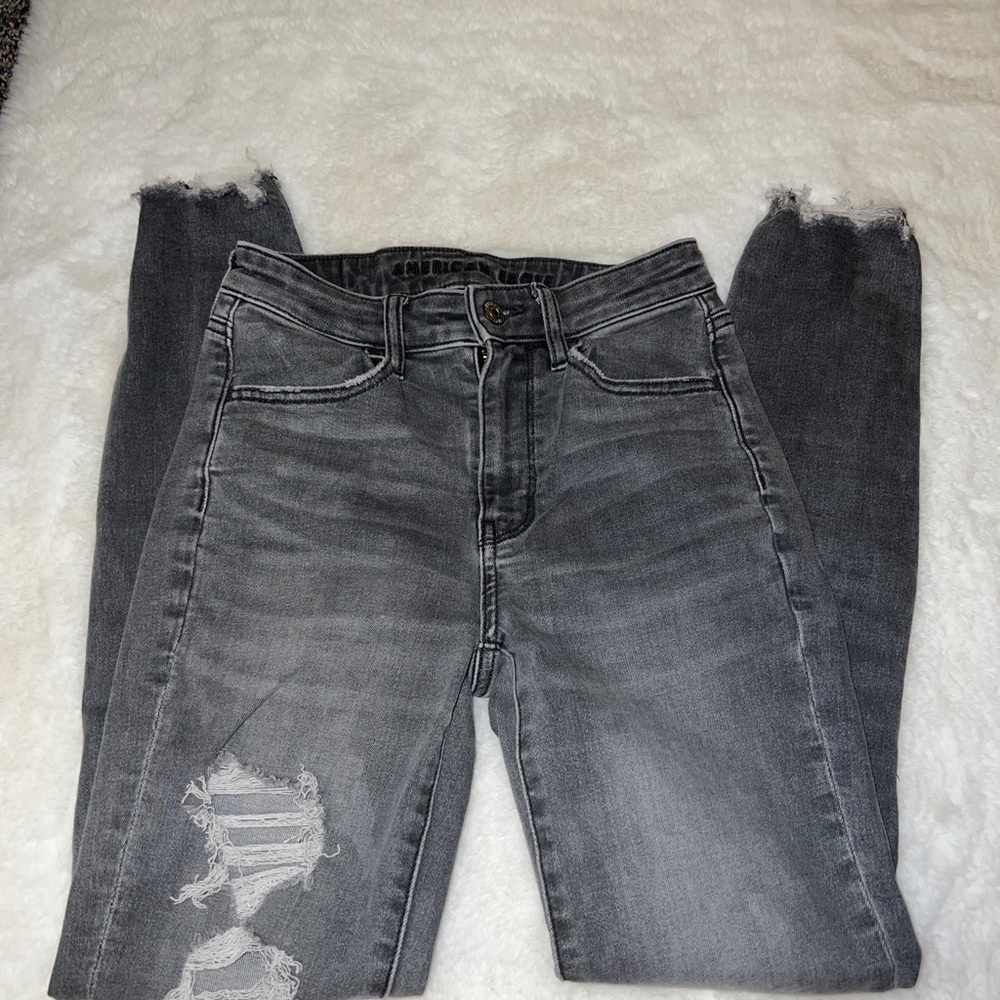 American Eagle super high rise jegging size 00 regular grey distressed style